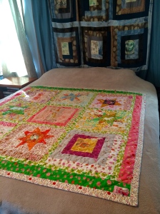 Finsihed quilt on my queen sized bed for scale.